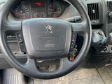 dashboard of a truck with a steering wheel and dashboard gauges