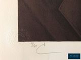an image of a piece of paper with a drawing of a man ' s face on it