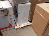 a pile of boxes and boxes sitting on the floor