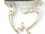 une table en argent et en or, surmontée d'un plateau en marbre