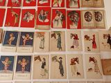 a lot of cards on the table with pictures on them