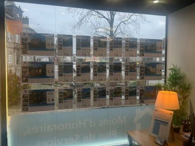 a picture of a window with a picture of a building in it