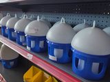 many plastic containers on the shelves in the store