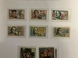 an image of a picture of a collection of stamps on a wall