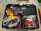 two black boxes filled with different types of rope