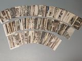 a lot of old photos on the wall of a room