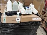 a pile of boxes and containers on the floor of a store