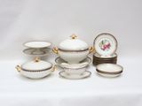 an image of a group of porcelain dishes and bowls on a table