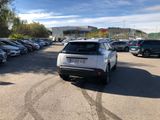 a lot of cars parked in a parking lot