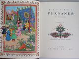 an open book with a picture of people in a garden
