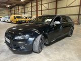 an image of a black audi parked in a garage
