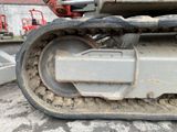 an image of a close up of a bulldozer tire