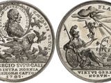 a drawing of a coin with a woman on it and a man on a horse