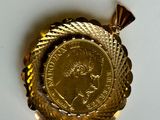 an image of a gold coin with a crown on it