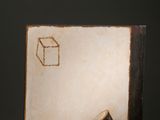 a close up of a book with a piece of paper on top of it
