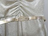 a close up of a dress with a belt on it