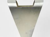 a silver vase with a metal base on a white background
