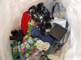 a bag full of clothes and a cell phone in it