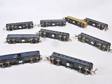 a lot of toy trains that are on the table