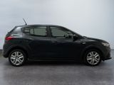 a picture of a black car parked in a garage