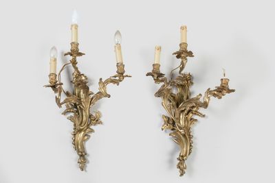 pair of antique brass wall sconces with flowers and leaves