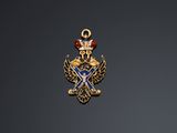 a close up of a medal on a black background