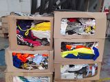 a stack of boxes with clothes on top of it