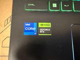 a close up of a computer keyboard with a sticker on it