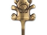 a teddy bear on a hook on a white background