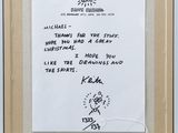 framed photograph of a note with a drawing of a dog on it