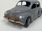 a toy car that is sitting on a white surface