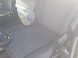 a picture of a seat in a vehicle with a steering wheel