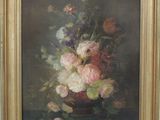une peinture à l'huile représentant des fleurs dans un vase sur une table