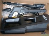 a box with a vacuum and other items inside of it