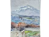 a watercolor painting of a view of a mountain range