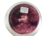 a glass bowl with a red liquid inside of it