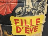 a poster on the wall that says fille d ' eve