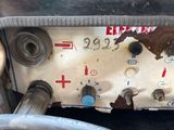 a close up of a machine that has a lot of rust on it