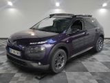a picture of a purple car parked in a garage