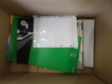 a box that has a bunch of papers inside of it