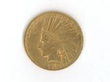 a gold coin with an indian head on it