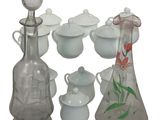 a lot of glass items that are sitting on a table