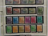 a close up of a binder with a bunch of stamps on it