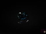 a blue diamond on a black background