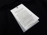 a tag that is attached to a black shirt