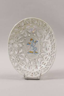 a white plate with a picture of a person on it
