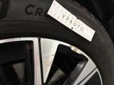 a close up of a tire with a sticker on it