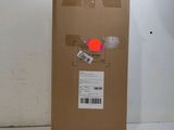 a box that is sitting on the floor next to a wall