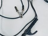 a black wire and a blue wire on a white table