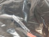 a plastic bag that has a pair of scissors in it
